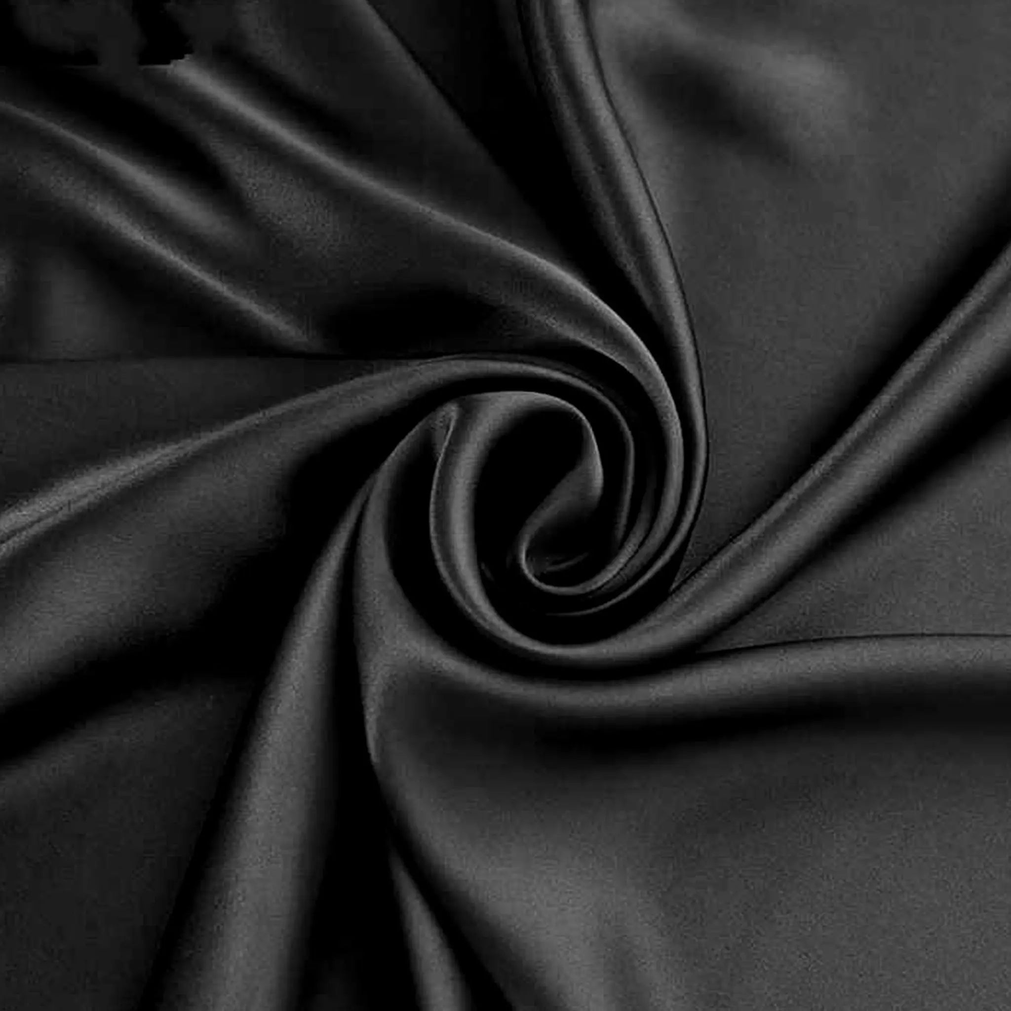 Black Beautymulberry silk fabric close-up — smooth 22 momme silk with natural sheen and soft texture.