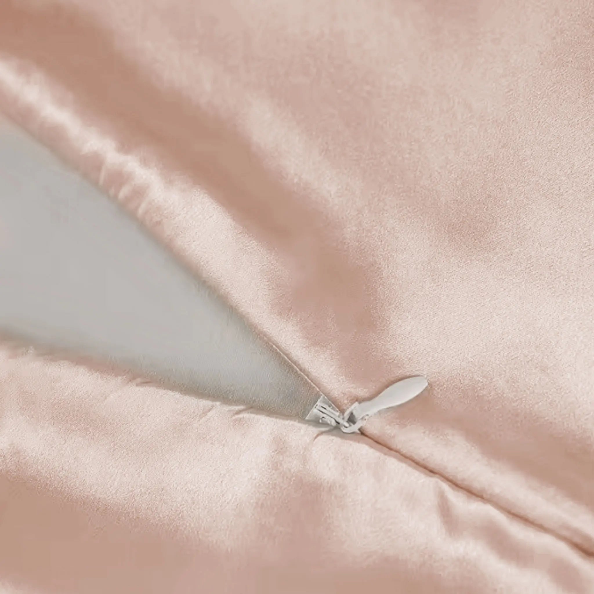 Invisible zipper detail on Soft Blush 22 momme mulberry silk pillowcase — Silk Souq premium silk bedding.