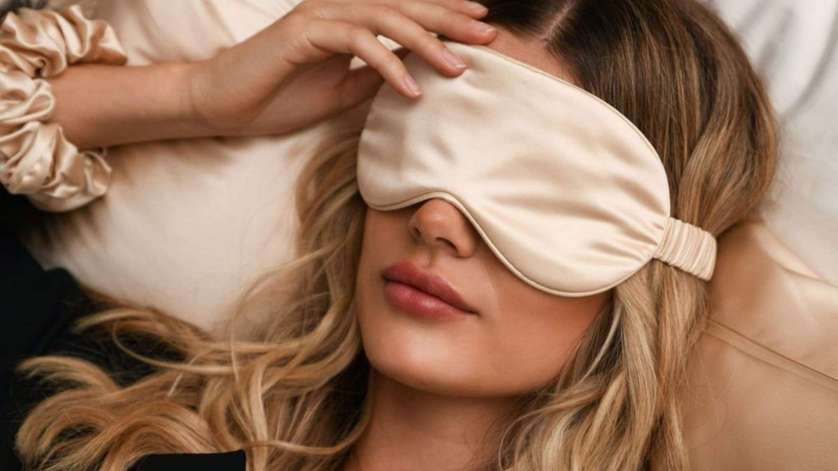 Achieving a beauty sleep with a pure silk sleep mask and hair scrunchie